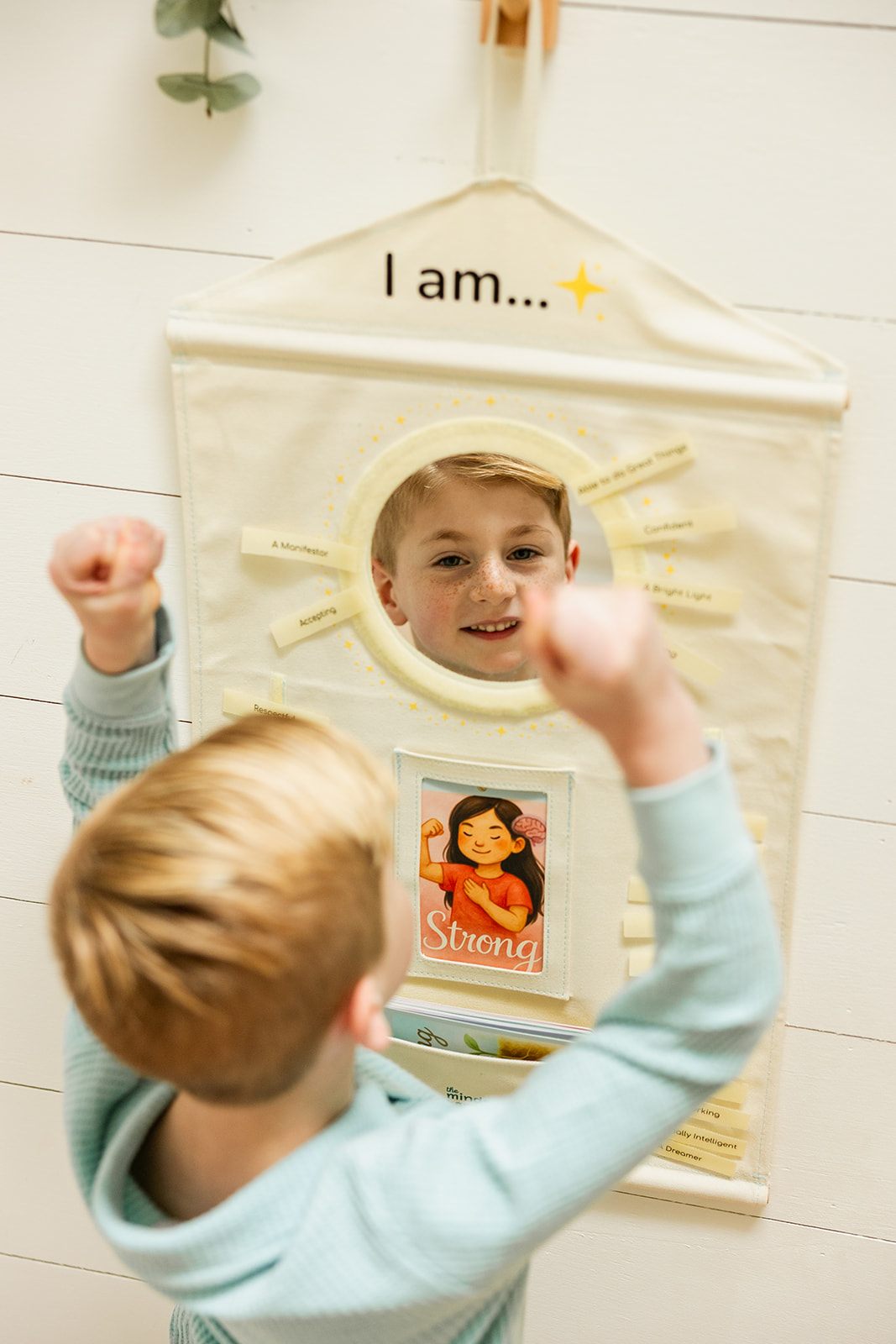 Child cheering at the Magic Mirror